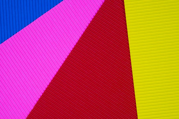 istock Multi coloured corrugated paper texture, use for background. vivid colour with empty space for add text or object. 1060669274