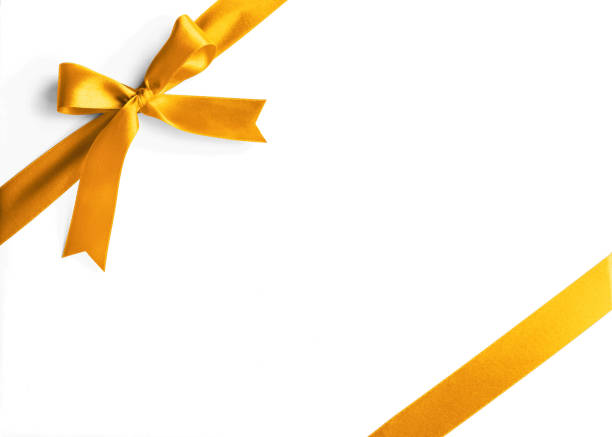 istock Gold satin ribbon corner stripe fabric bow isolated on white background with clipping path 1060670616