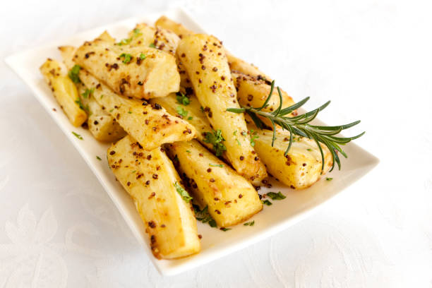 istock Roasted Parsnips with Wholegrain Mustard and Rosemary 1060670880