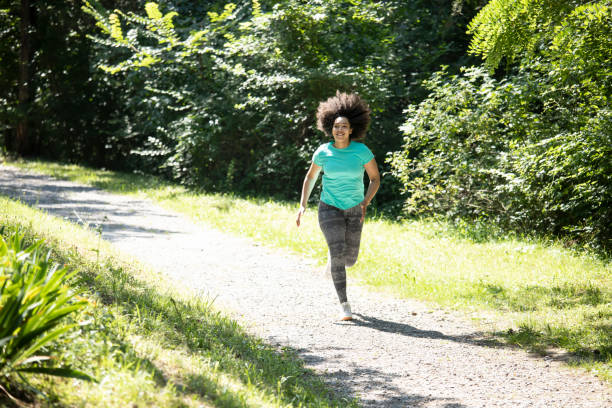 istock African woman jogging in park 1060675410