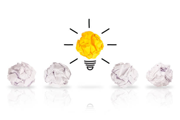 istock Idea Concept Light Bulb Crumpled Paper on White Background 1060711100