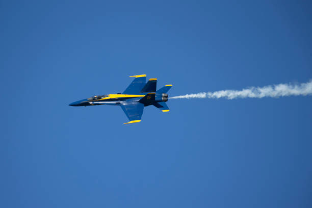 US Air Force F/A 18 Super Hornet Plane approaching the speed of sound, Vapor cloud of Sonic Boom Visible.