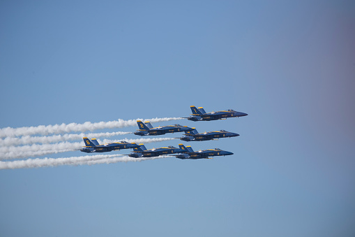 San Francisco, California,USA- October 7,2018. Blue Angels F-18 Hornet jet fighters flying in formation at 2018  Air Show in San Francisco, California. The  Air Show features 3 days of military aircraft performing for free to the general public.
