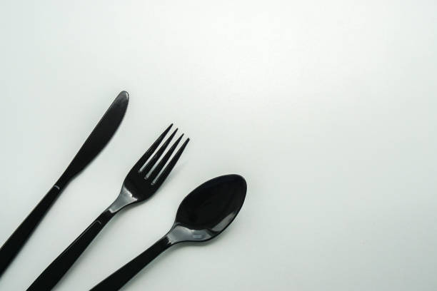 istock isolated black plastic cutlery for meal 1060732506