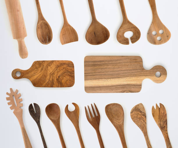 istock Kitchenware set of wooden fork, spoon and utensils on white background. 1060736262