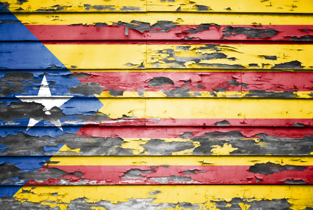 Concept Catalonia flag on cracked and paint peeling off background stock photo