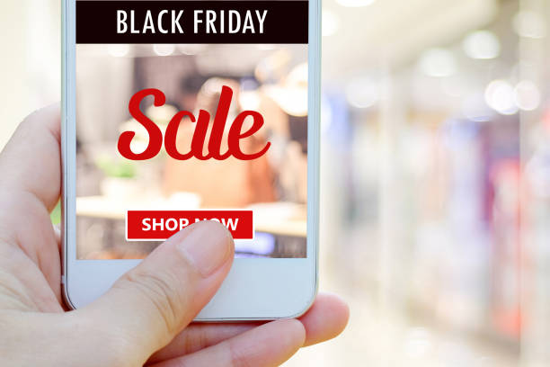istock Woman hands using smart phone with black friday sale web banner on screen background, Online shopping sale, business and technology 1060743104
