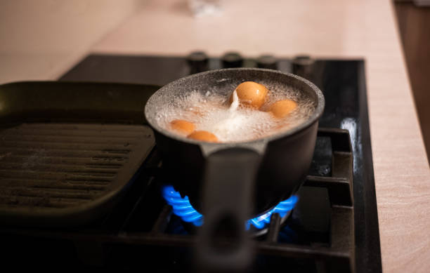 istock Boling eggs in cooking pan on gas stove. 1060761506