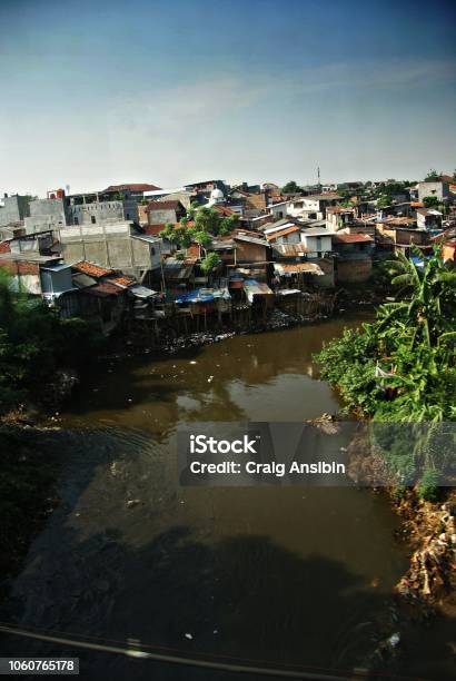 Jakarta Slums Area Seen From A Moving Train Stock Photo - Download Image Now - Aerial View, City, Poverty