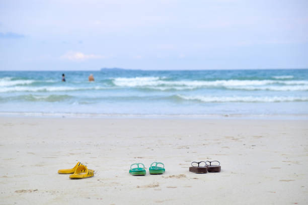 shoes on sea beach,holdiay concept.