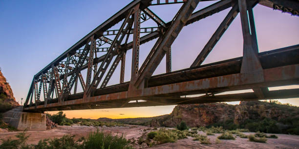 istock Bridge and train track over the Arizona desert 1060772032