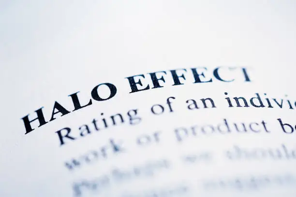 In a list of business terms, 'Halo Effect' is defined.