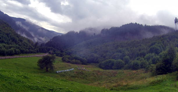 istock Clouds and fog over Carpathian mountains 1060779874