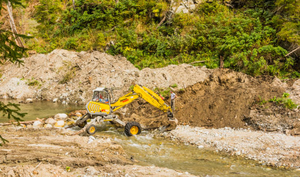 Excavator in agricultural land