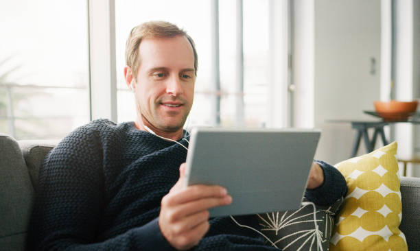 istock Enjoying his uncapped wifi for uninterrupted connections 1060785776