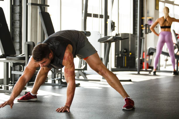 istock Exercising in the gym 1060785804