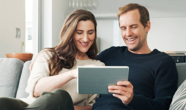 istock They're a couple who like to stay current 1060785850