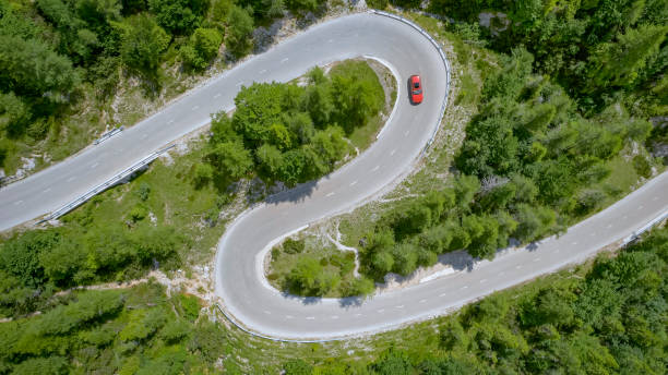 istock Car moving on winding road 1060789134