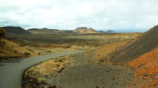 istock winding road through volcanic landscape with crater 1060790756