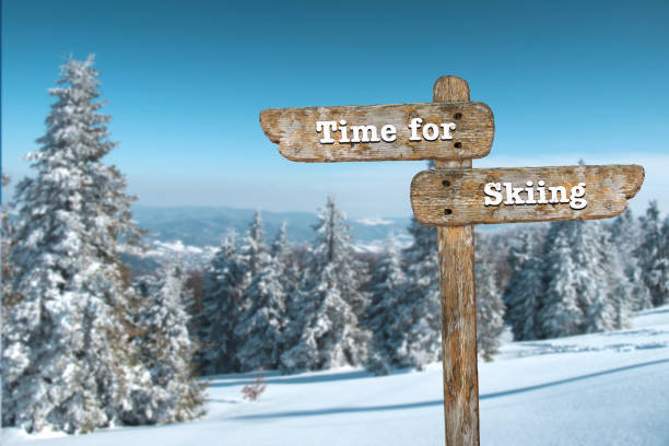 istock Time for skiing. Information sign and blurred background. 1060793682