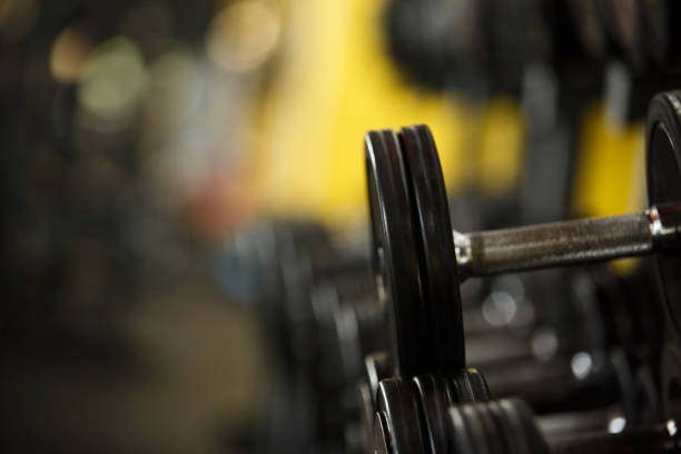 istock Dumbbells in the gym 1060794654