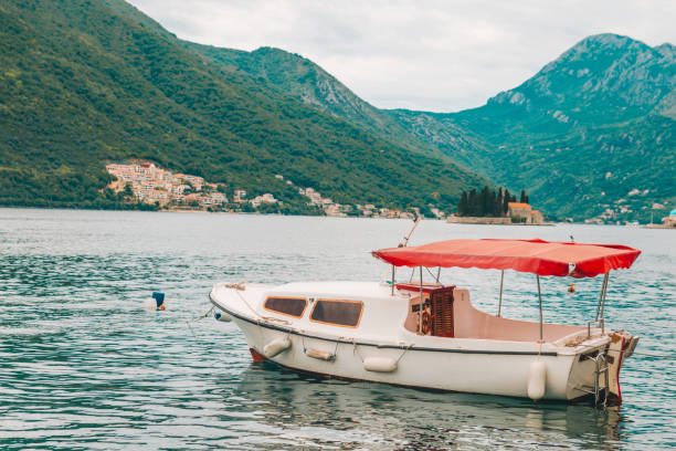 istock boat in blue sea water 1060798356