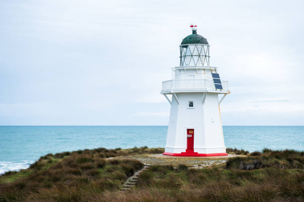 istock Waipapa point, the lighthouse, ocean and cloudy. 1060800854