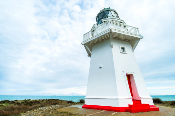 istock Waipapa point, the lighthouse, ocean and cloudy. 1060800880