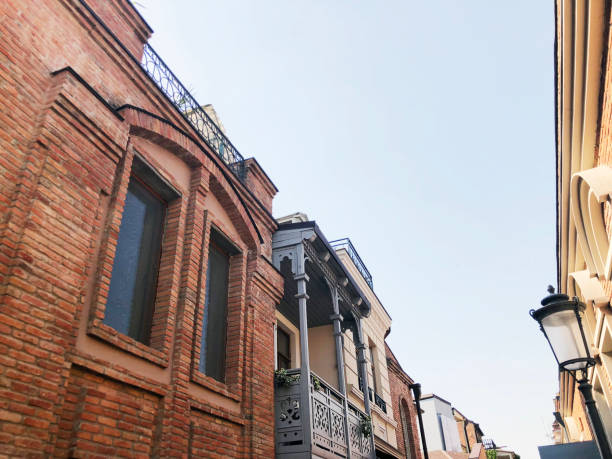 istock Old Tbilisi architecture, windows and balcony exterior decor in autumn day 1060801358
