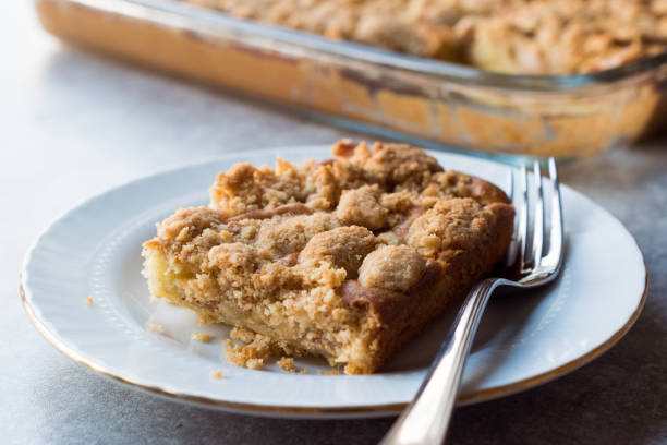 istock Homemade Apple Crumble Cake Slice with Fork. 1060807956