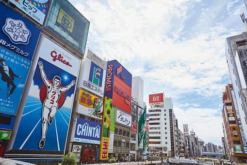 Japan travel and landmarks.\nOsaka Dotonbori district signs and advertisement.