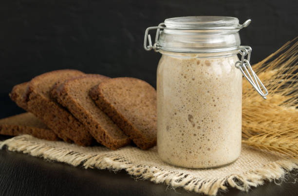 istock Active rye sourdough in a glass jar for homemade bread. 1060817418