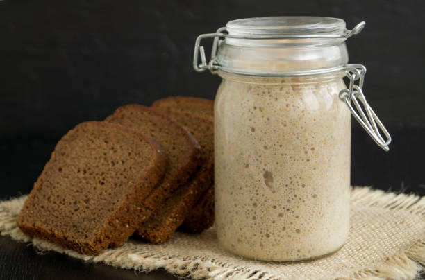 istock Active rye sourdough in a glass jar for homemade bread. 1060817446