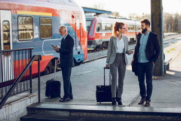 istock Senior businessman using mobile phone at train station. 1060817856