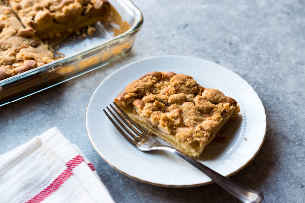 istock Homemade Apple Crumble Cake Slice with Fork. 1060817942