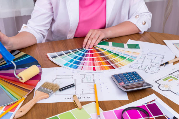 istock Designer hands with colour swatch choosing color 1060822732