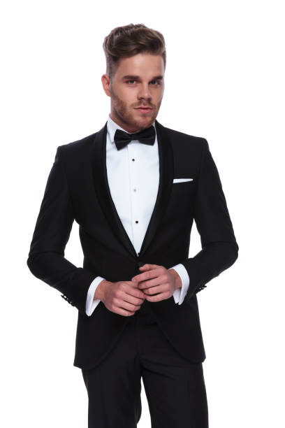 istock young groom holding palms together 1060838186