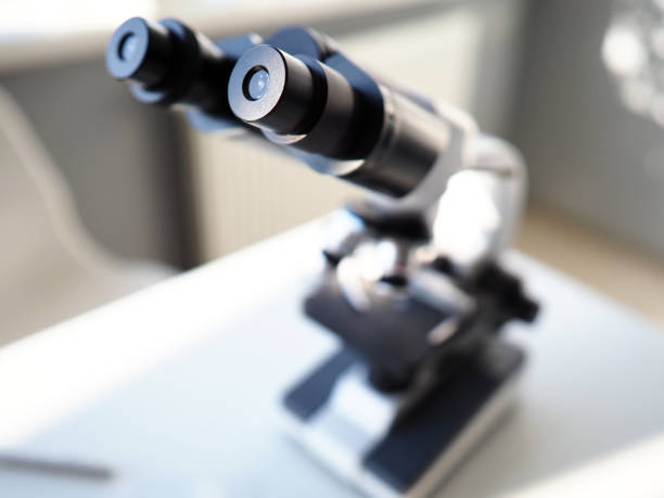 istock Scientific binocular view magnifier workspace room closeup 1060846496