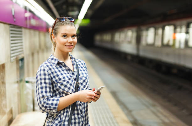 istock Girl waiting for train at metro station 1060855638