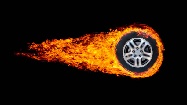 istock car wheel or circle enveloped in flames isolated on black background. 1060858270