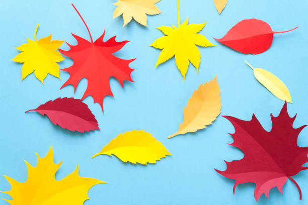 istock Autumn leaves on blue background. Autumn concept 1060860498