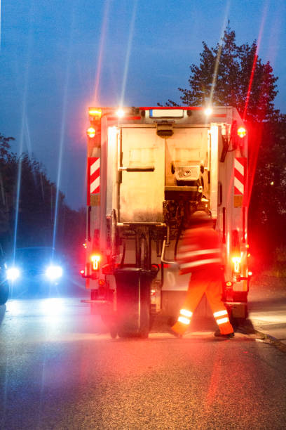 Garbage truck at work in the morning