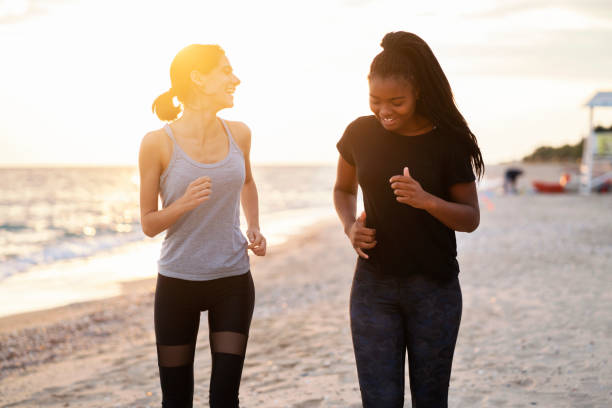 istock Girls jogging together 1060865184
