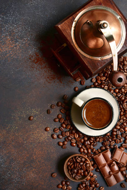 istock Cup of hot coffee with ingredients for making 1060866602