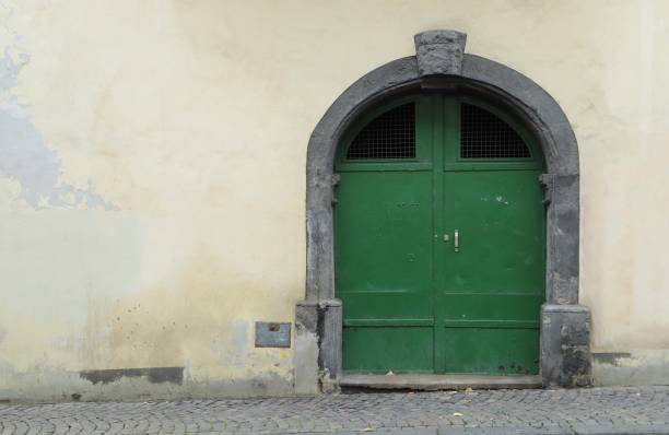 istock old green iron door. 1060869524