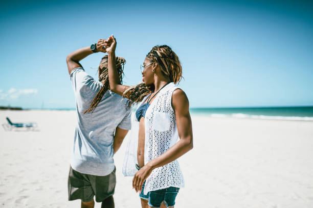 istock African American Couple Is Practicing Their Wedding Dance On The Beach 1060874114
