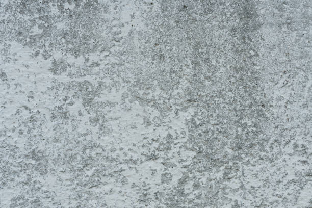 istock Wall fragment with attritions and cracks 1060877398