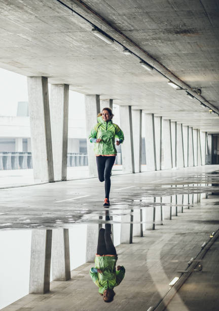 istock Female Athlete Running in an Urban Environment 1060881392