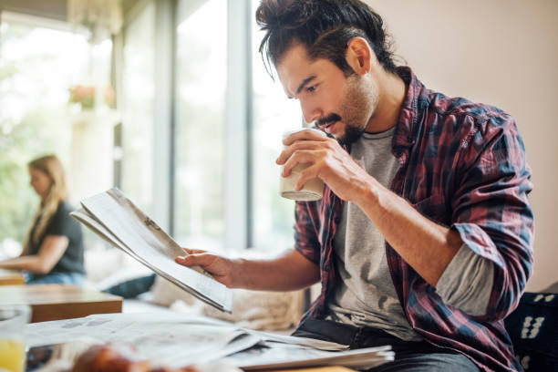 istock Keeping himself updated with daily news 1060888682