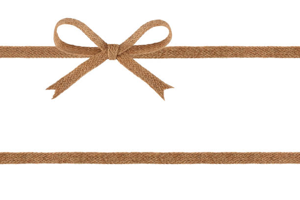 istock Burlap jute ribbon bow isolated on white background 1060891254